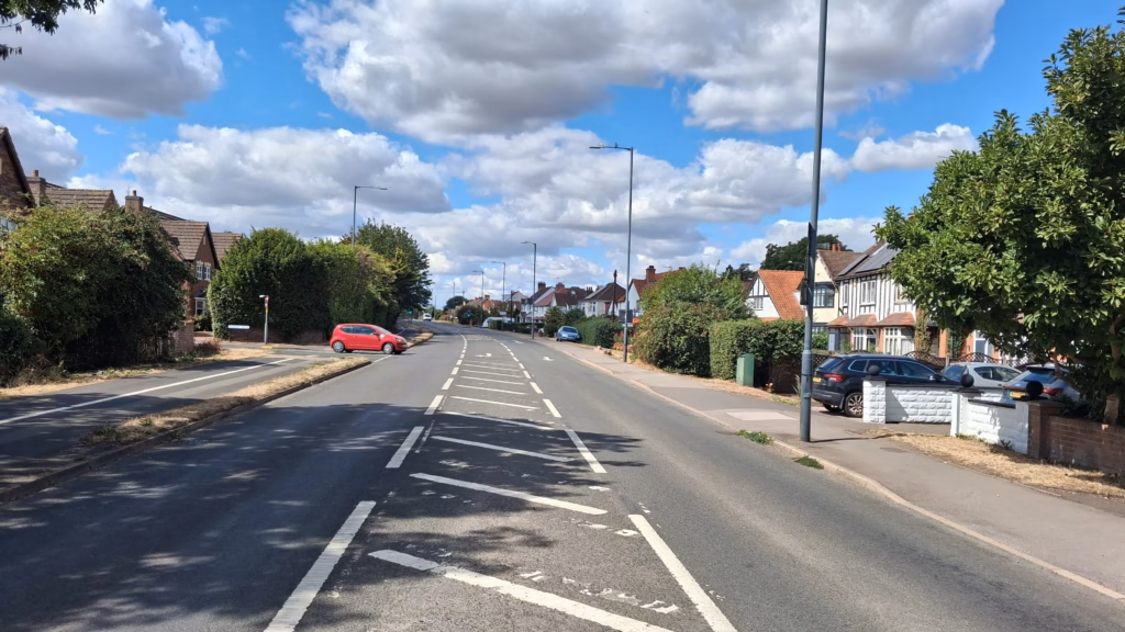 Alcester Road in Stratford-upon-Avon, a wide main road lined with houses