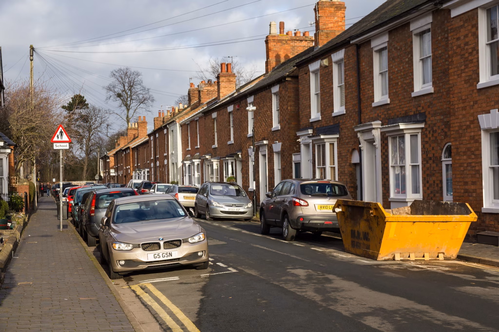 Broad Street, Stratford-upon-Avon, with a school warning sign and Victorian terraced houses